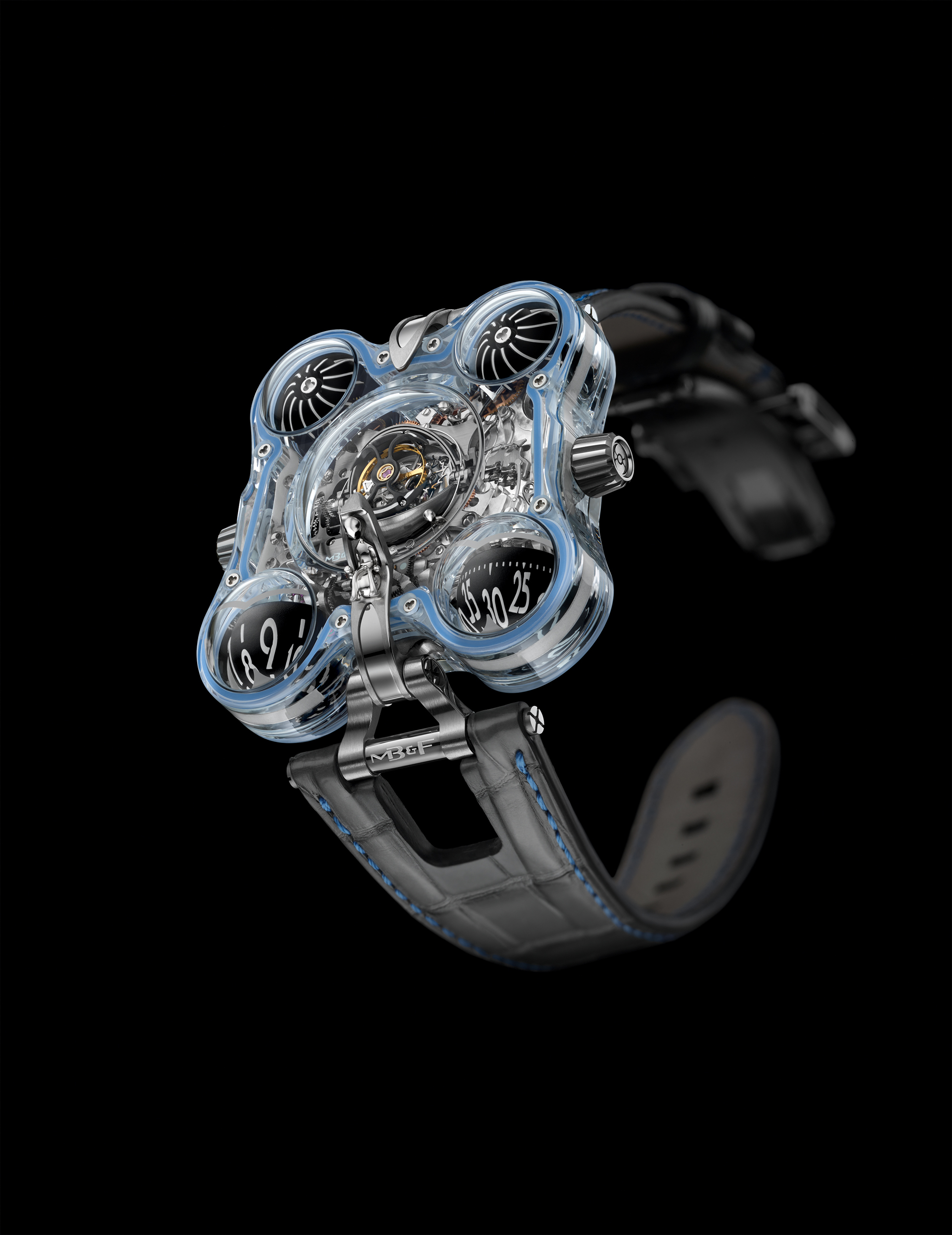 Each of the four unique MB&F HM6 Alien Nation watches has a different glow: turquoise, green, blue, purple.